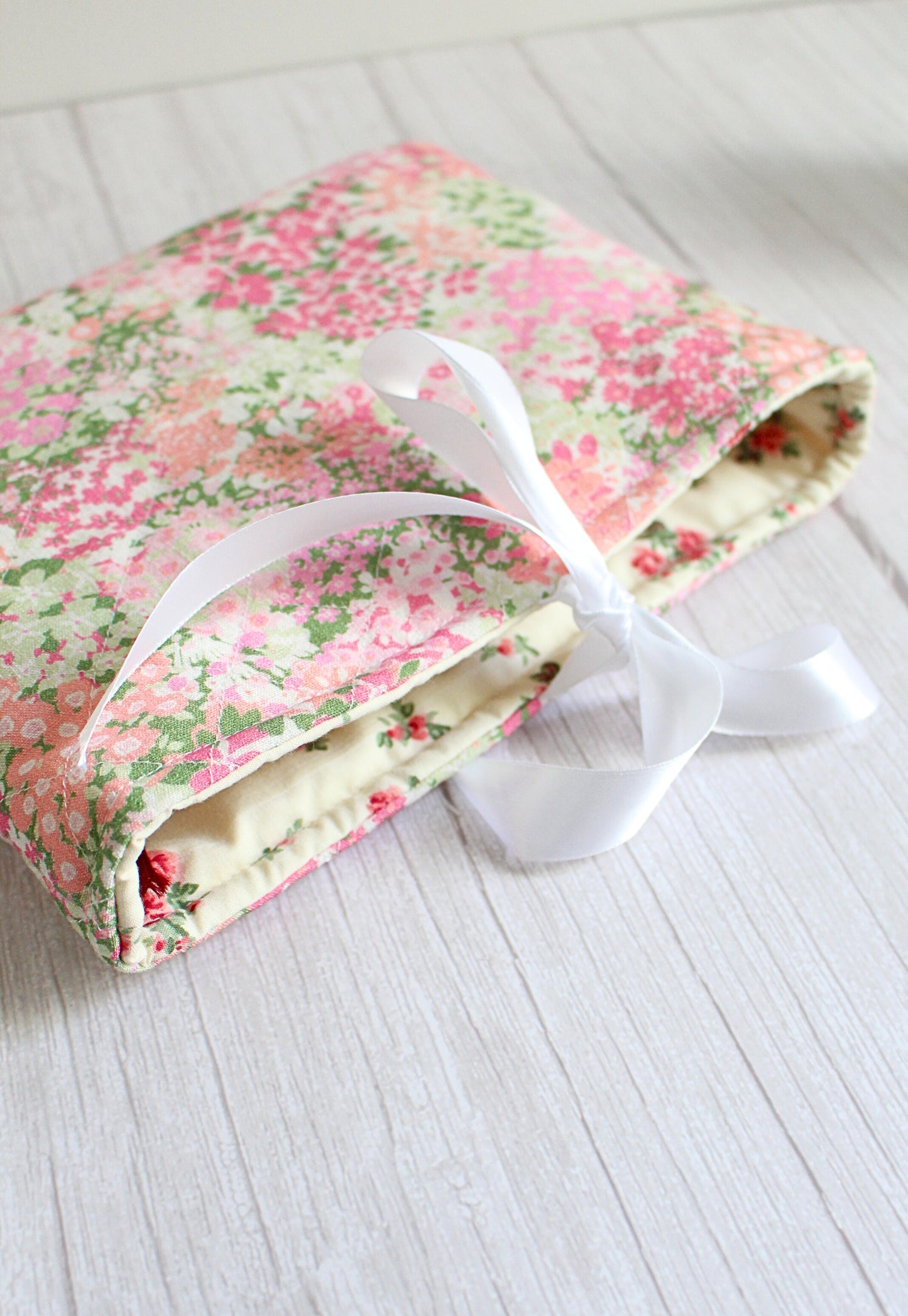 Pink Floral Fabric Quilted Book Sleeve with White Ribbon Closure